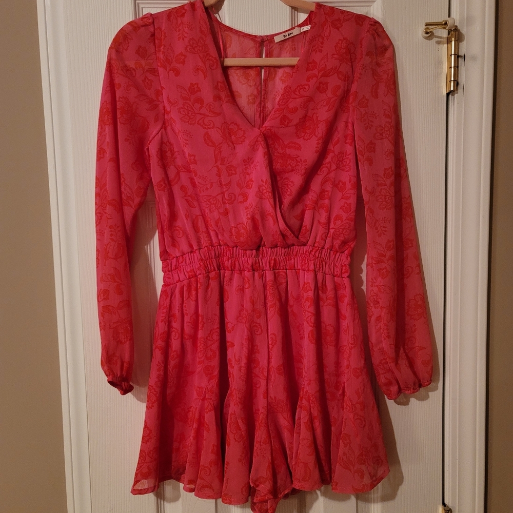 Mi Ami Hot pink dressy mini romper with sheer sleeves and back.